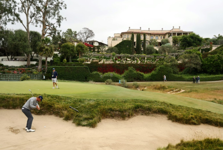 American Lucas Glover plays a bunker shot during a practice round prior to the 123rd US Open at Los Angeles Country Club