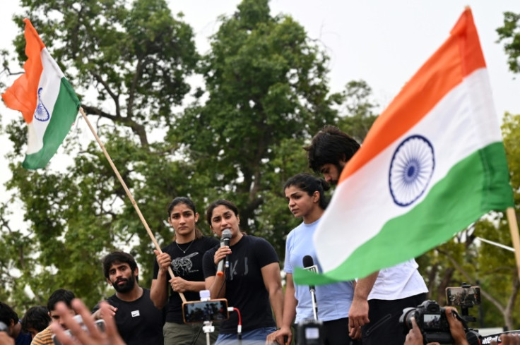 Olympic medallists and other Indian wrestling champions accused the wrestling chief of groping women athletes and demanding sexual favours