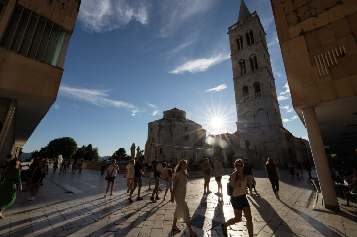 People walk in the old town of Zadar