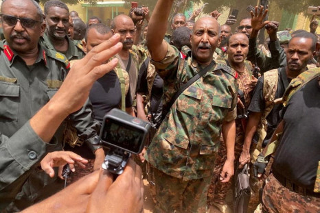 Sudan's General Abdel Fattah al-Burhan talks to troops about truce extension