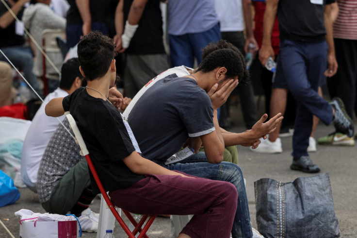 Migrants, survivors of deadly shipwreck, are transferred to Athens from Kalamata