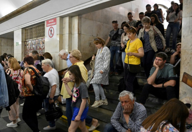 Local residents take refuge in a metro station in the center of Kyiv. Many shun the purpose-built but poorly maintained bomb shelters