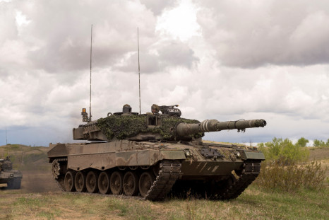 Leopard 2A4 tanks from the Royal Canadian Dragoons C Squadron travel in the Wainwright Garrison training area during Exercise in Wainwright