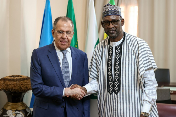 Mali's Foreign Minister Abdoulaye Diop -- seen here with visiting Russian Foreign Minister Sergei Lavrov in February 2023 -- has called for an end to the UN peacekeeping mission in his country