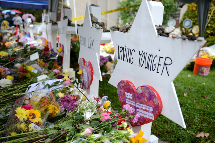 People gathered outside the Tree of Life synagogue in Squirrel Hill to hold a vigil a week after a deadly shooting there