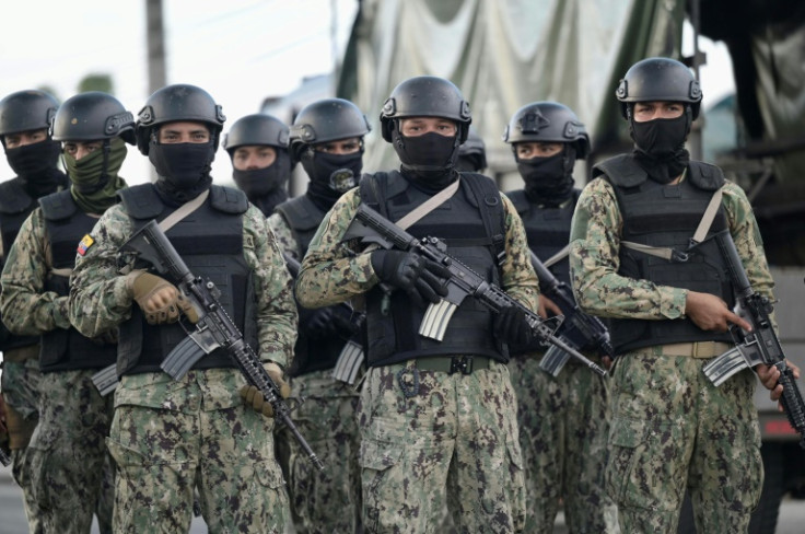 Soldiers stand guard outside the overcrowded and violent Guayas 1 Prison in Guayaquil