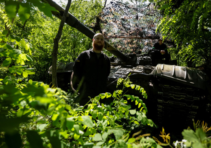 Ukrainian service members are seen on their position at a front line in Donetsk region