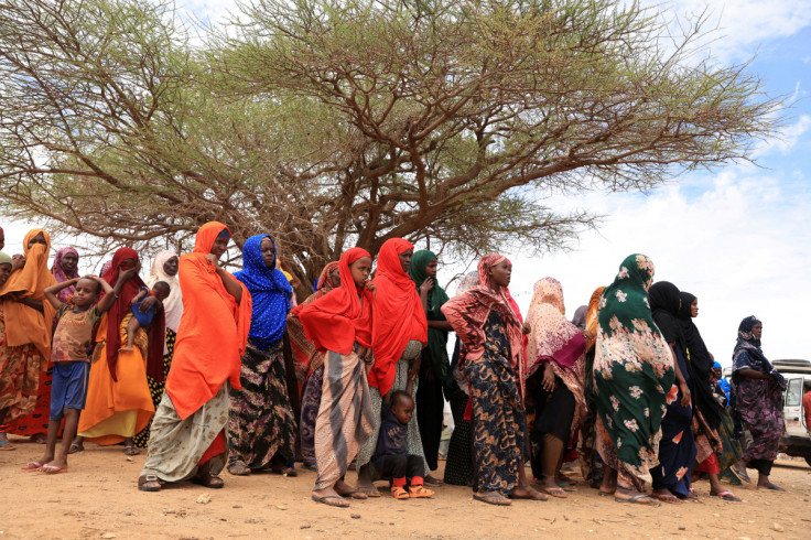 Internally displaced Ethiopians queue to receive food aid at the Higlo camp in Gode