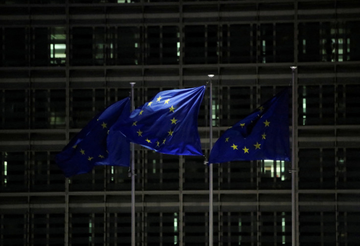 European Union flags flutter outside the European Commission headquarters in Brussels