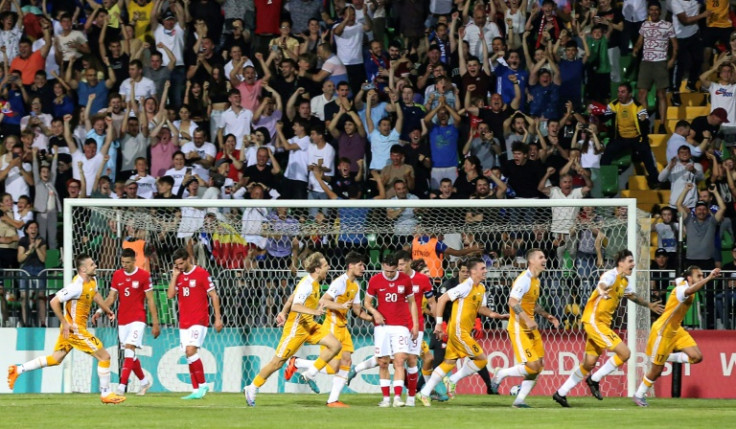 Moldava celebrate their remarkable winning goal against Poland