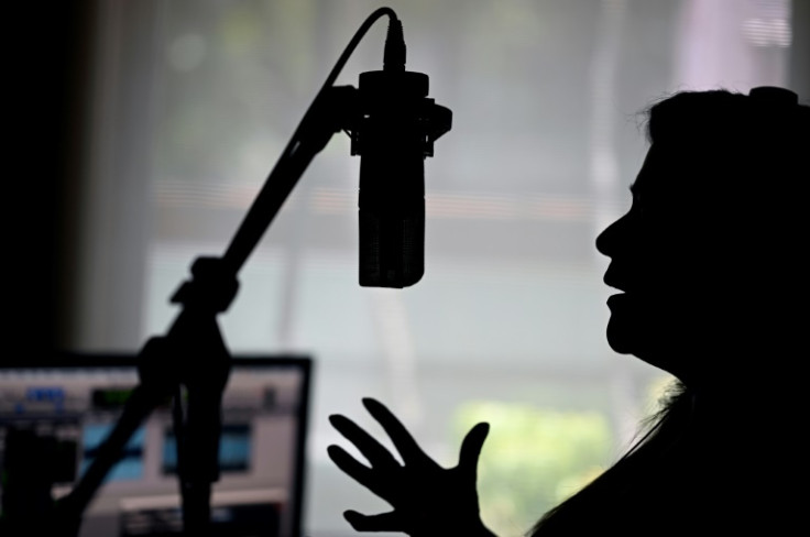 Dessiree Hernandez, president of the Mexican Association of Commercial Announcers, speaks at a recording studio in Mexico City