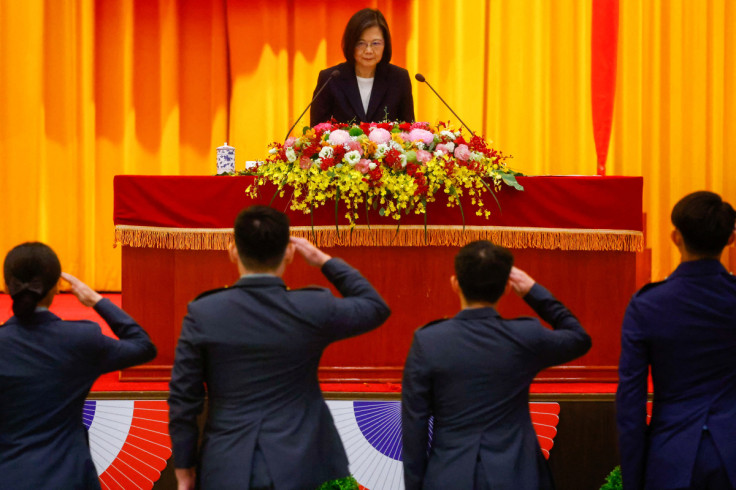 Students salute Taiwan's President Tsai Ing-wen during a graduation ceremony at the National Defense University in Taipei