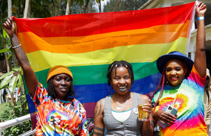 Participants hold a Pride flag as they attend the Badilika festival to celebrate the LGBT rights in Nairobi