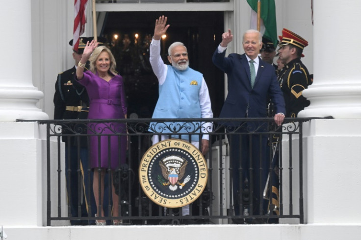 US First Lady Jill Biden, India's Prime Minister Narendra Modi and President Joe Biden wave from the Truman Balcony during a welcoming ceremony for Modi at the White House