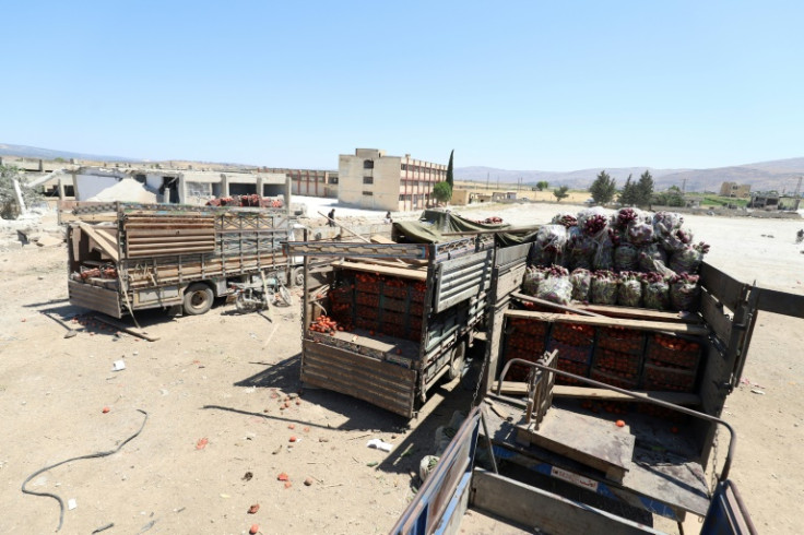Most of the civilians were killed at a vegetable market in Jisr al-Shughur, where vagetable trucks were also damaged