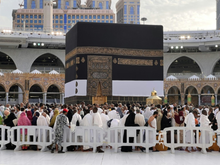 The rites of the hajj include circling the Kaaba, the large black cube in Mecca's Grand Mosque