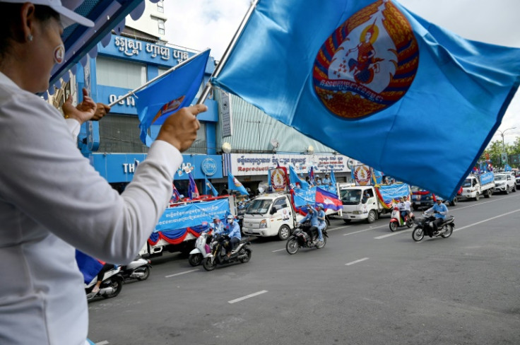 Cambodian People's Party supporters paraded through the streets of Phnom Penh on Saturday
