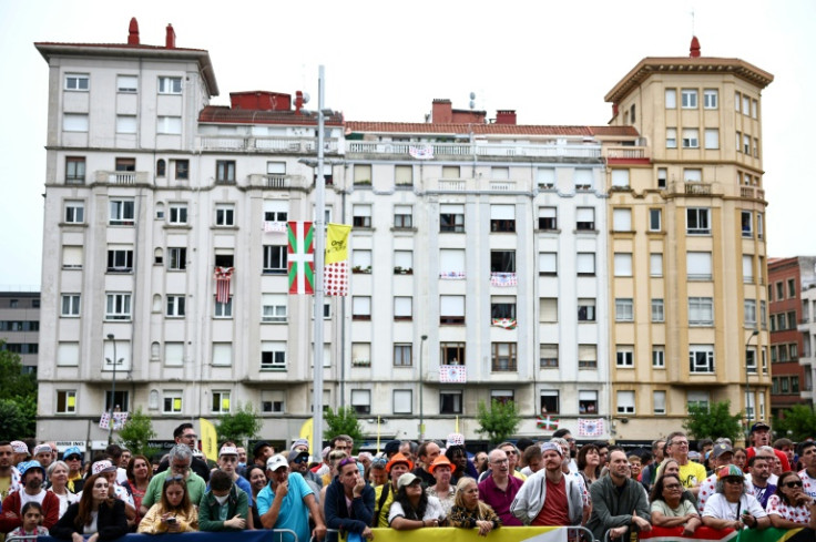 Spectators line the roadside in Bilbao