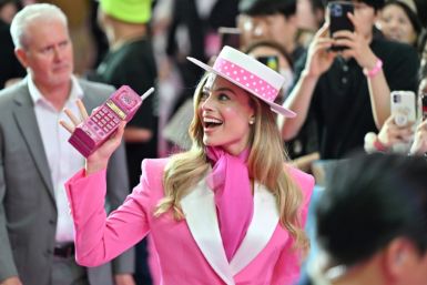 Australian actress Margot Robbie meets fans during a pink carpet event to promote her new film "Barbie" in Seoul