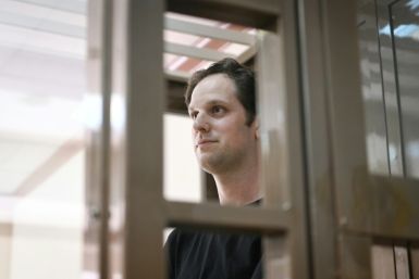 US journalist Evan Gershkovich, arrested on espionage charges, stands inside a defendants' cage before a hearing to consider an appeal on his extended detention at The Moscow City Court in Moscow in June, 2023.