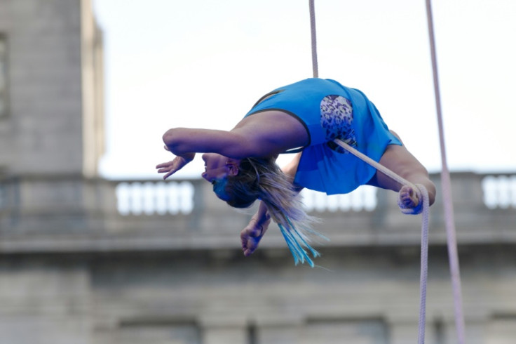 An aerial acrobat performing during the outdoor circus festival in Montreal