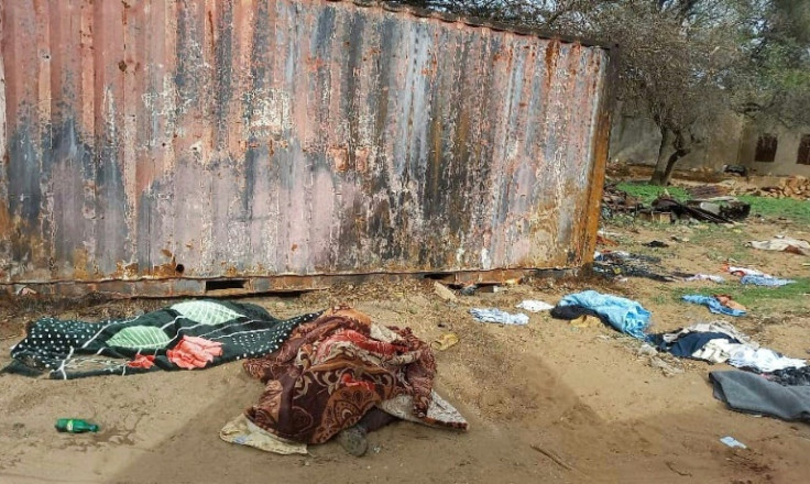 Covered bodies lie in the West Darfur state capital El Geneina, on June 16, 2023