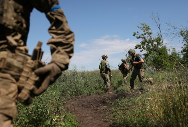 Ukrainian servicemen of the 22th mechanized brigade operate at a recaptured position near the village of Klyshchiivka south of Bakhmut
