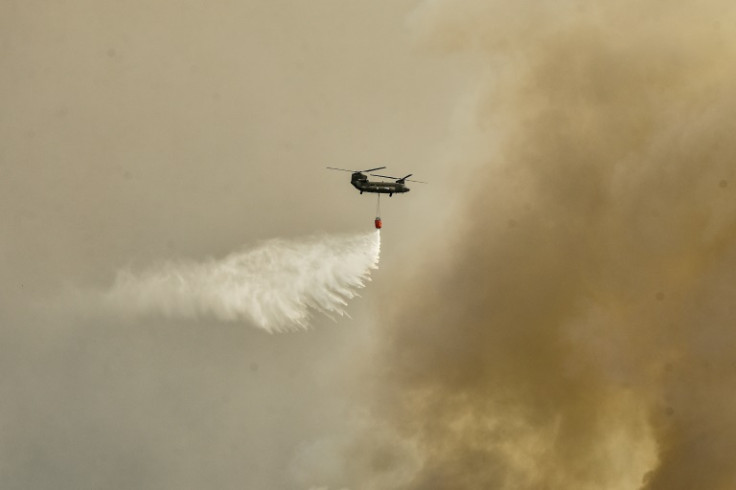 Firefighters battled blazes in parts of Greece