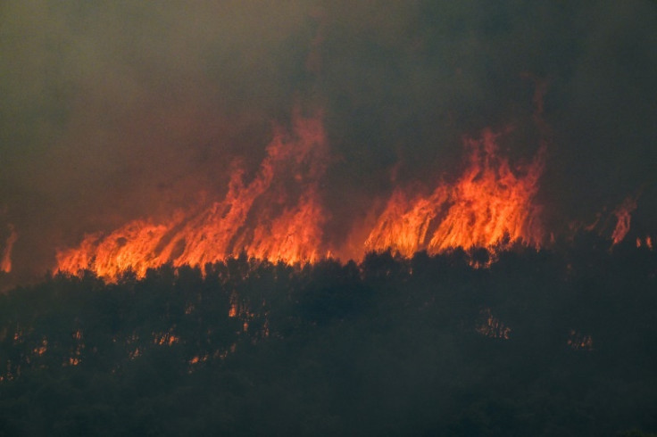 Soaring temperatures have made efforts to contain fires outside Athens difficult
