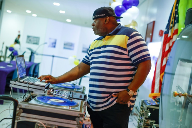 DJ Chuck Chillout plays music at the Queens Public Library -- one of many events planned to celebrate the 50th anniversary of the birth of hip-hop