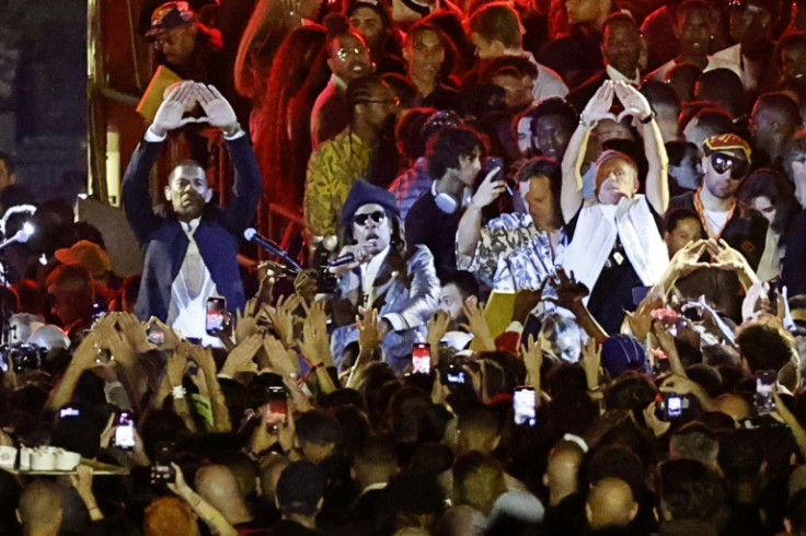 Jay-Z performed a free show on the Pont Neuf in Paris after the Louis Vuitton Menswear Spring-Summer 2024 show, the first for the label's new designer, hip-hop artist Pharrell Williams