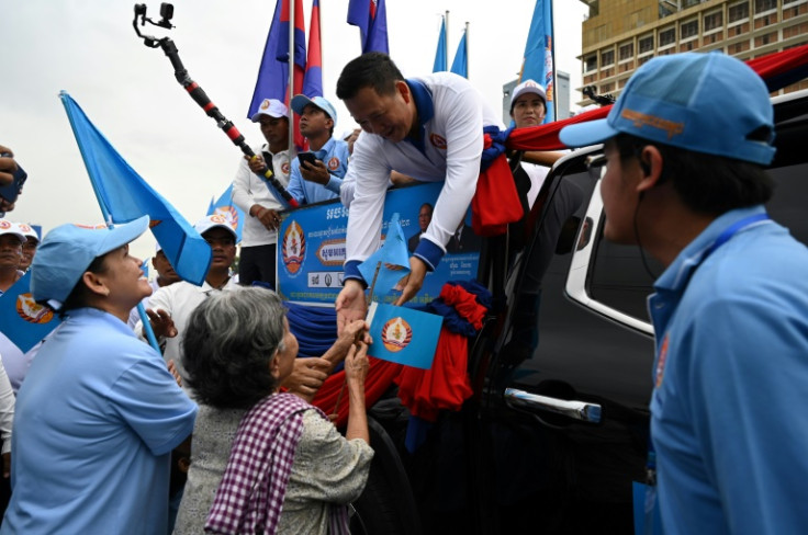 A crowd of tens of thousands on motorbikes gathered to hear Hun Manet's speech, before he roared off in a motorcade parade around Phnom Penh
