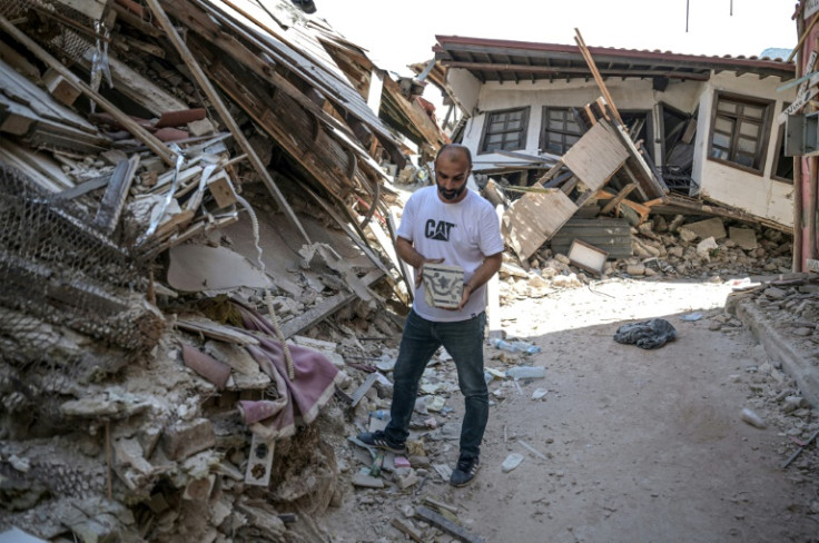 Architect Gokhan Ergin, a specialist on ancient buildings, among the ruins of Antakya