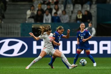 Switzerland's Seraina Piubel and Philippines' Sofia Harrison  fight for the ball during the World Cup Group A match at Dunedin Stadium