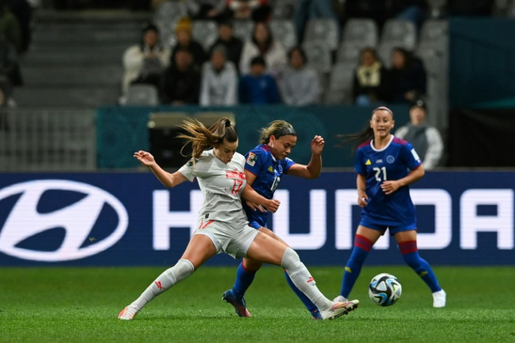 Switzerland's Seraina Piubel and Philippines' Sofia Harrison  fight for the ball during the World Cup Group A match at Dunedin Stadium