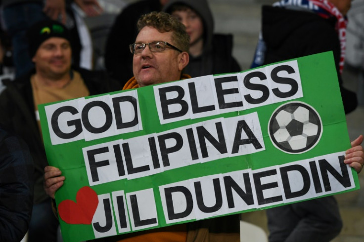 A fan holds a sign in the stands during the Australia and New Zealand 2023 Women's World Cup Group A football match between the Philippines and Switzerland
