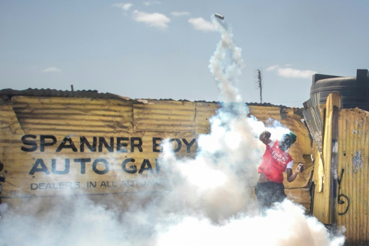 In Nairobi's Kibera slum, running battles erupted between police and protesters carrying rocks and crude weapons