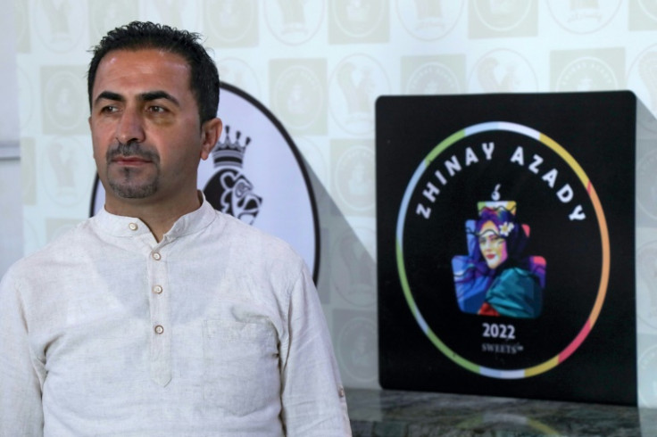 Iranian Kurd Rizgar Khasraw has named his sweets shop after Mahsa Amini