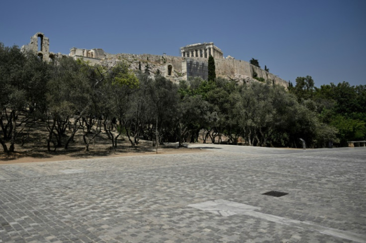 The pedestrian zone near the Acropolis in Athens is empty of tourists and residents as Greece faces its hottest July weekend in 50 years