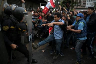 Protesters clash with police during demonstrations against Peru's President Dina Boluarte in Lima