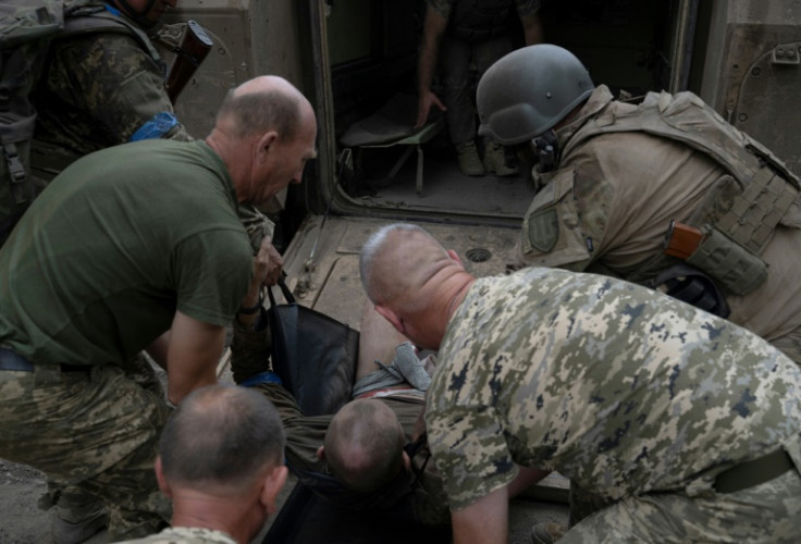 Ukrainian military medics risk their lives evacuating wounded soldiers from battlefields