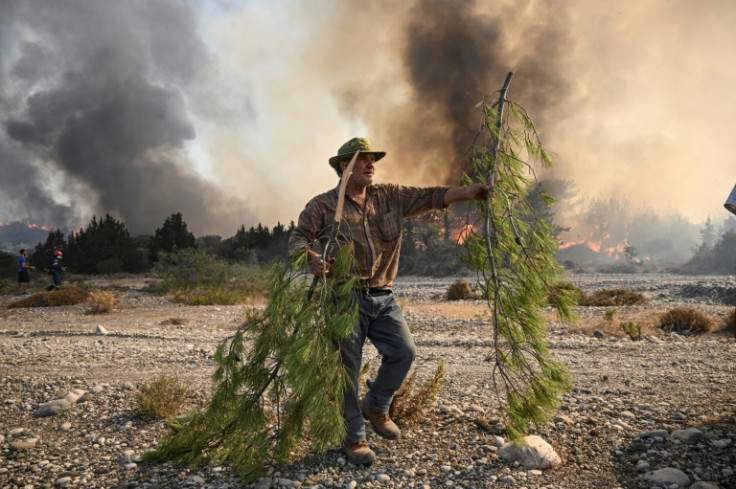 Locals on Rhodes have been helping to tackle the fires and support stranded tourists