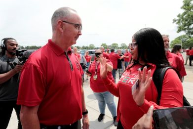 Earlier this month, UAW President Shawn Fain shunned the symbolic handshake with car executives to kick off negotiations and instead spoke with workers