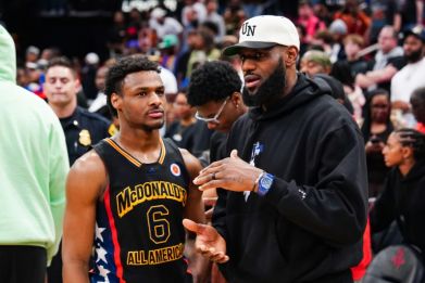 Bronny James (left), the son of NBA star LeBron James (right), suffered a cardiac arrest while practicing with his college team