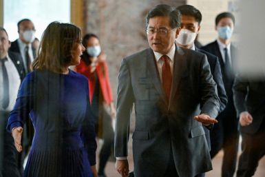 Qin Gang (R) served as China's foreign minister until his abrupt removal from the post following an absence that has sparked questions about his whereabouts
