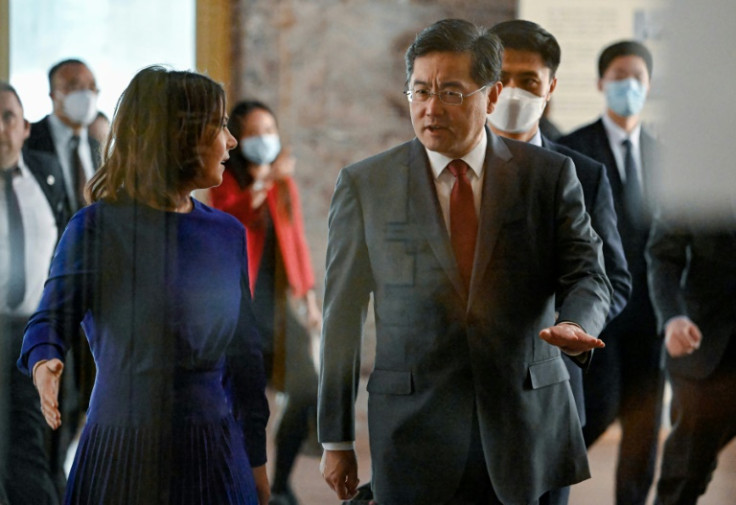 Qin Gang (R) served as China's foreign minister until his abrupt removal from the post following an absence that has sparked questions about his whereabouts