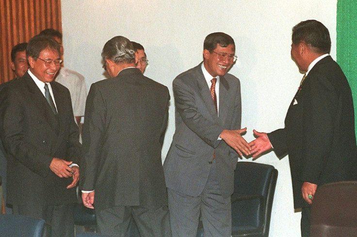 Hun Sen (2nd R) lost the first election he contested in 1993 but seized power four years later in a coup