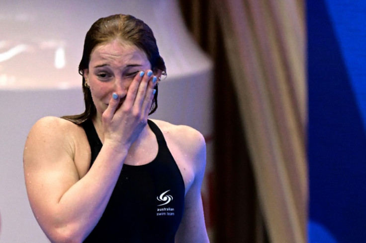 Australia's Mollie O'Callaghan celebrates after victory in the final of the women's 200m freestyle swimming event during the World Aquatics Championships