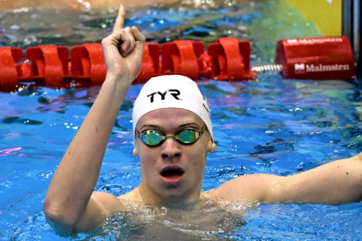 France's Leon Marchand reacts after competing in the final of the men's 200m butterfly swimming event during the World Aquatics Championships