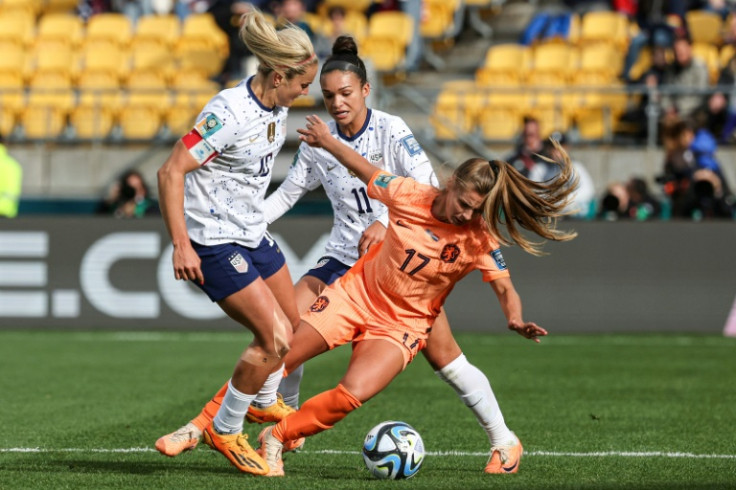 Lindsey Horan (L) scraps for possession with Victoria Pelova during the 1-1 draw between the USA and the Netherlands on Thursday. Horan scored her team's second-half equaliser